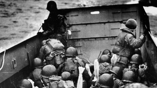 American soldiers approaching the beaches of Normandy on June 6, 1944.