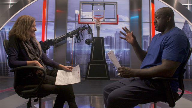 Host Lisa New with former NBA player Shaquille O'Neal