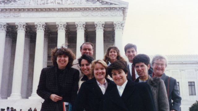 Penny Cooper and her team standing in front of the Supreme Court.