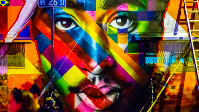 Brazilian street artist Eduardo Kobra finishes his "Tupac and Biggie Street Art Tribute" in Wynwood during Miami Art Basel in 2013.