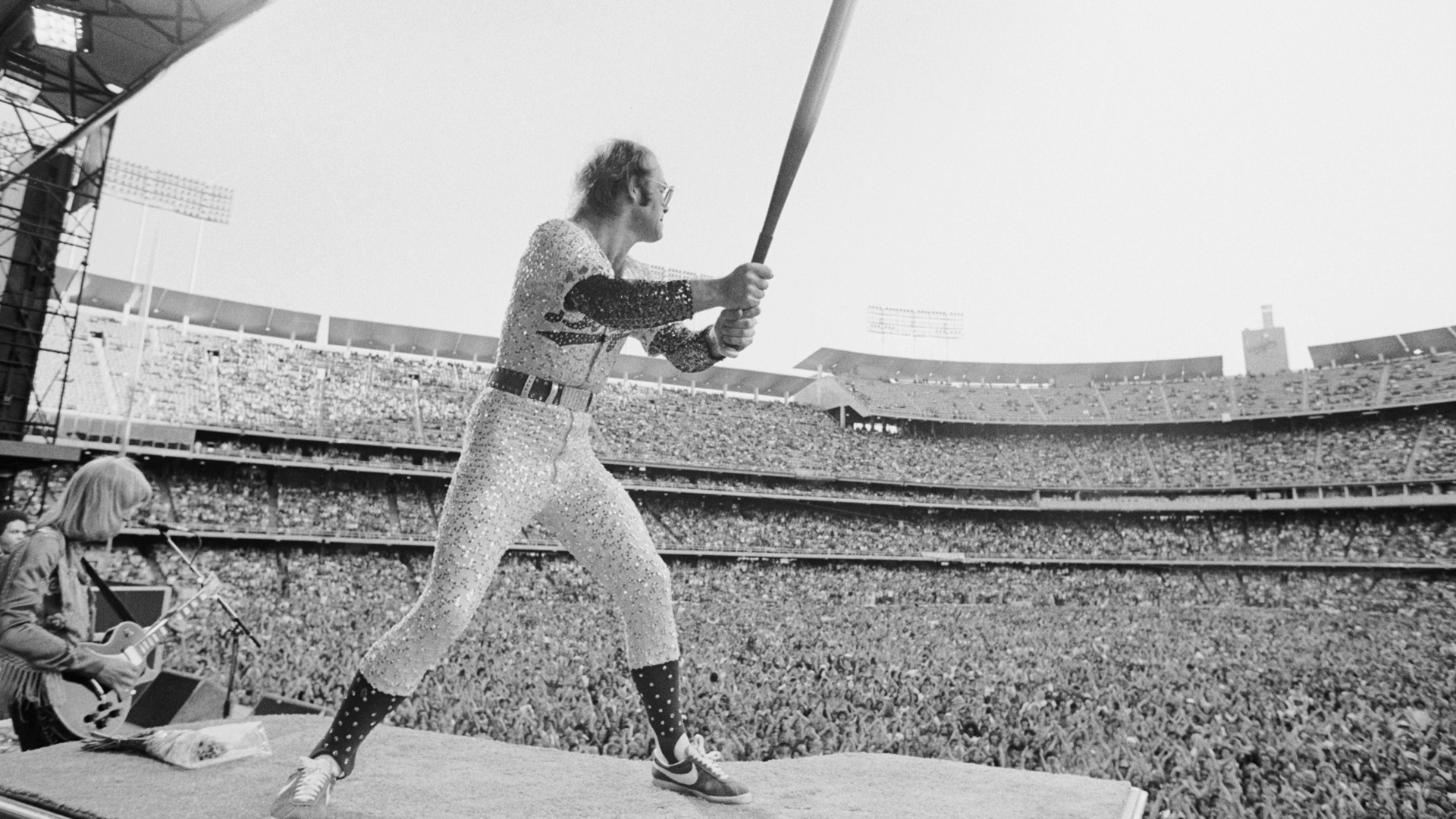 This documentary follows the career of the iconic rock star through the prism of his ever-changing style.